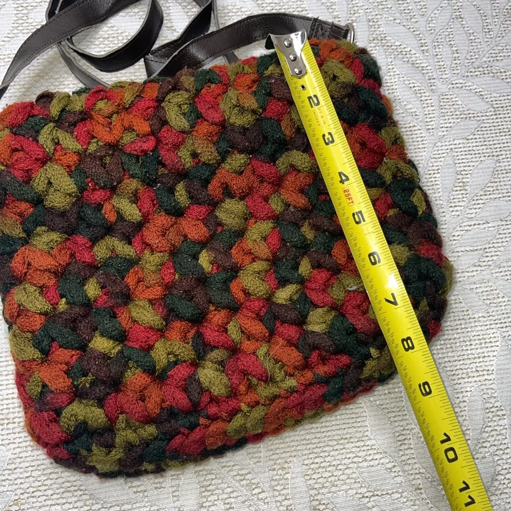 crossbody bag made with funky chunky, variegated yarn toggle closure
